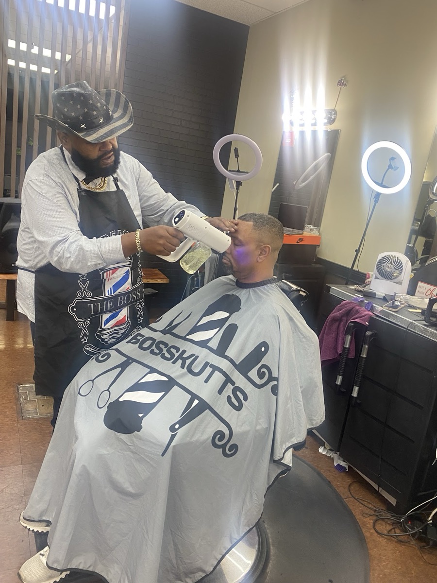Big Country finishing a cut at Brown's Barber Lounge